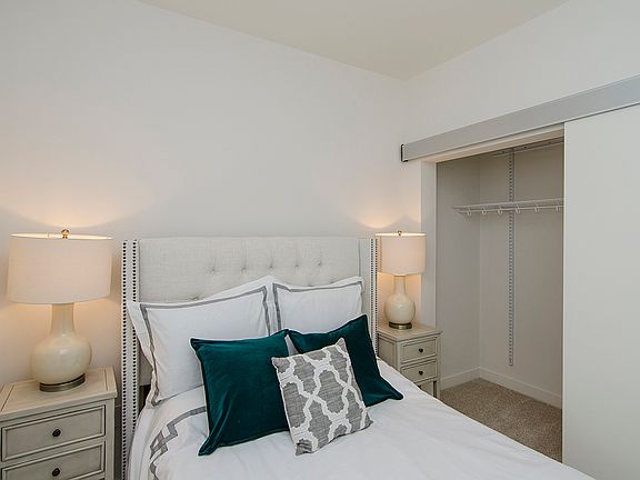 Apartment bedroom with closet space (staged)