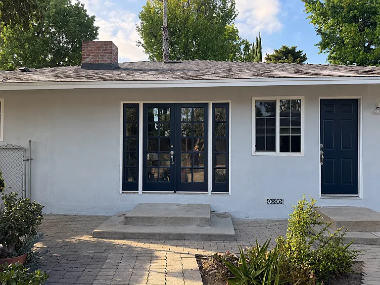 Back entry to master bedroom and kitchen