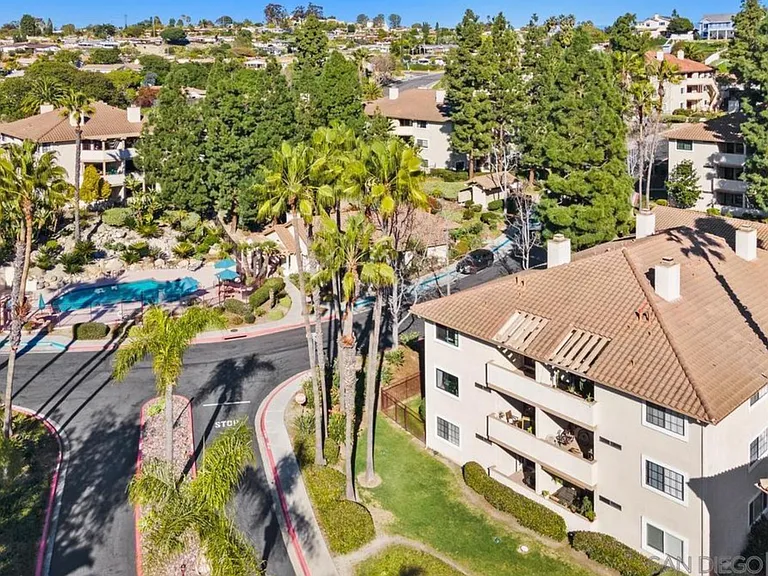 View of building and pool 1 (condo is top-left unit, club house is next to pool).