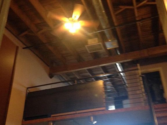 very cool loft with exposed beams