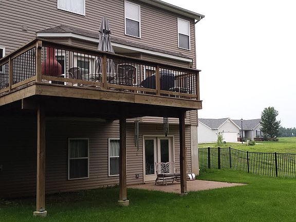 Fenced back yard with deck!