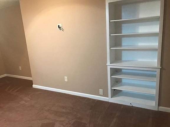 Livingroom with built in bookshelves