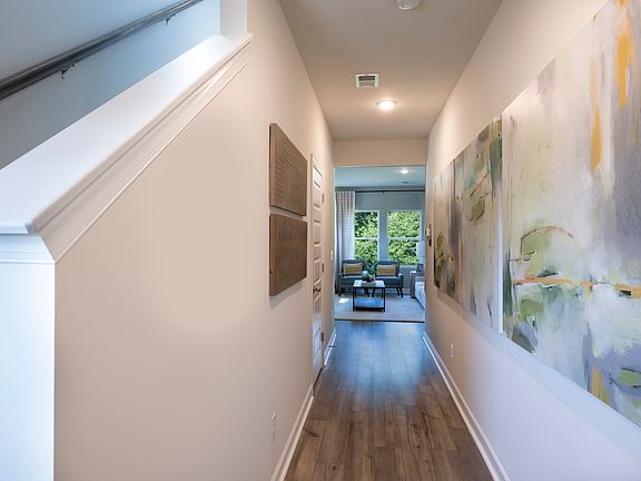 The Lennon floorplan modeled at Village at White Pine.