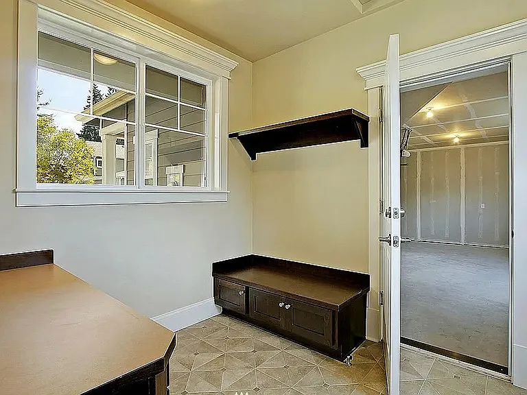 Mud room between the garage and the kitchen area