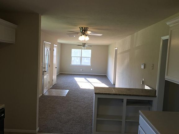 Kitchen view to dining and livingroom