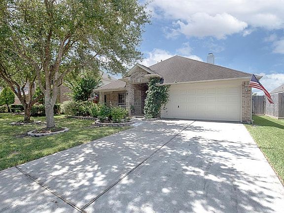 Great elevation and plenty of additional parking outside of the garage for your guests when entertaining.