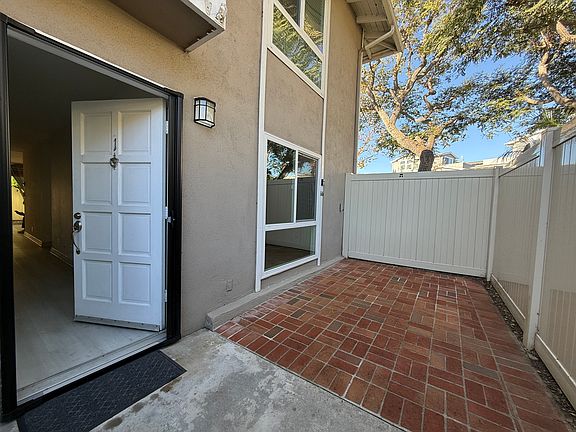 Spacious and clean entry patio, bring your own cozy patio furniture.