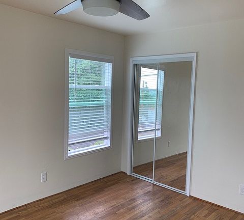 bedroom two with view of city