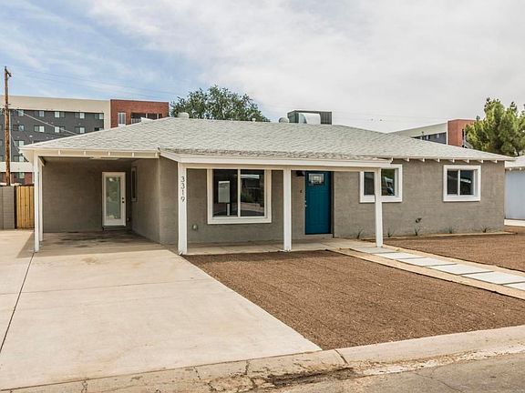 Carport in front/Garage in backyard