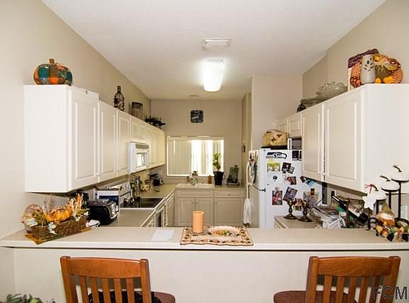 3rd image of 2001 Palm Dr Unit B102