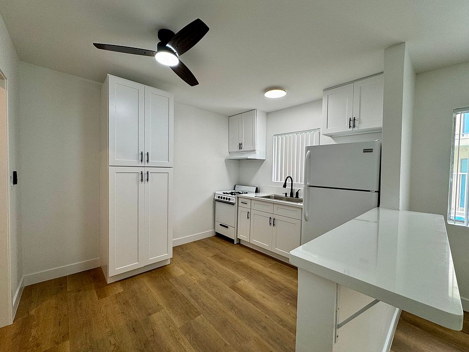 All photos are actual photographs of a comparable unit with a similar floor plan and finish style, shown for reference only.