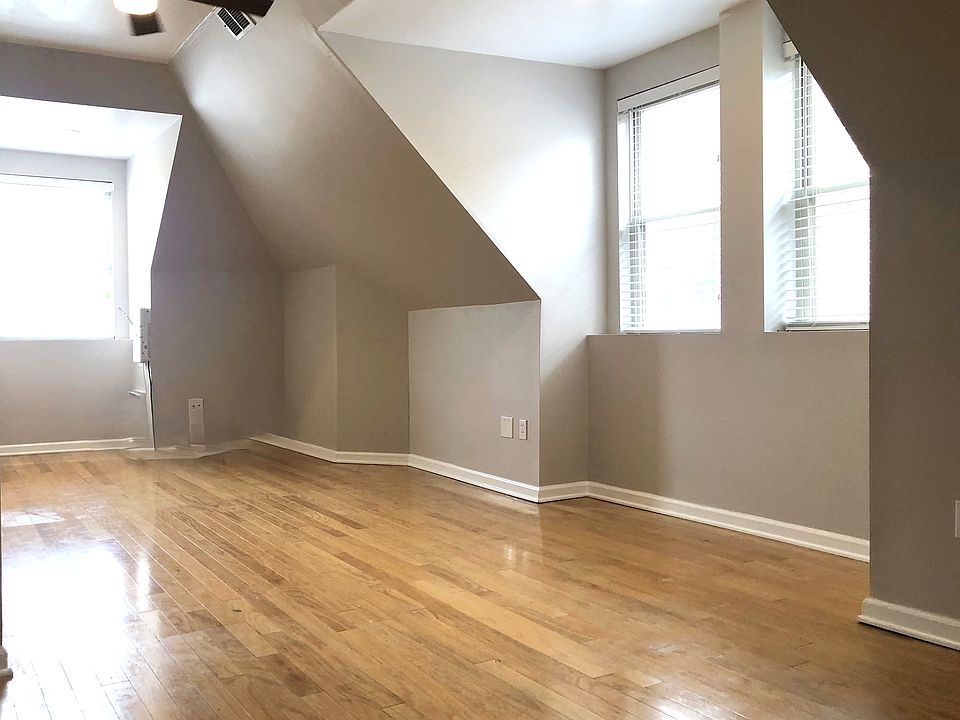 Beautiful Sunlit Living Room 
Hardwood floors throughout