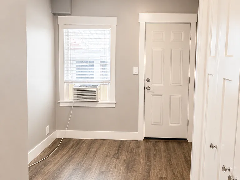 Flexible second bedroom ideal for a guest room, home office, or nursery.