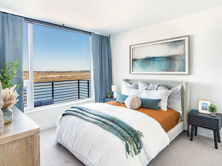 Bedrooms with water views, soft natural light, and comfortable space to unwind.