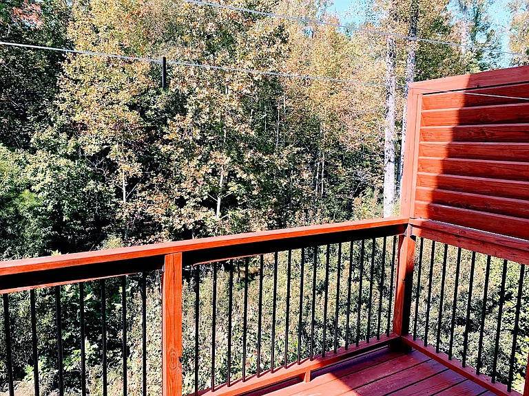 Deck open to Wooded area