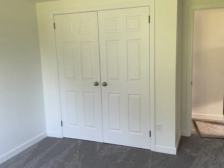 New carpet, doors, electrical and woodwork in upstairs bedroom.