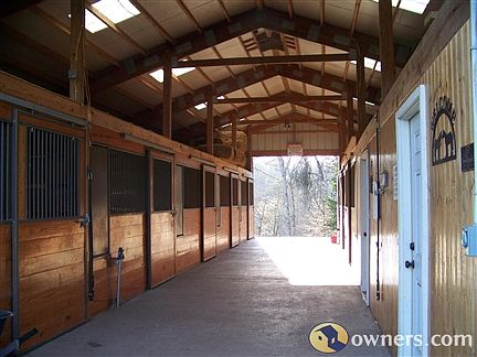 8-stall Morton barn has full bath, feed and tack rooms