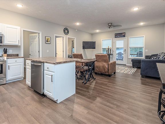Open living room/dining area/kitchen