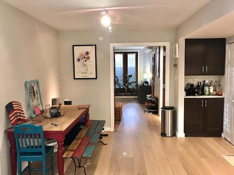 Taken from part of the living room that shows dining space & bedroom