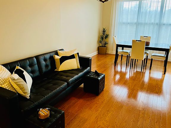 Another view of the living room and dining room