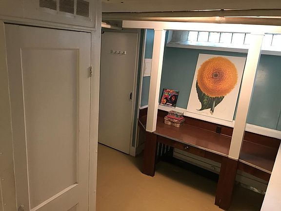 Changing area with built in office and closet