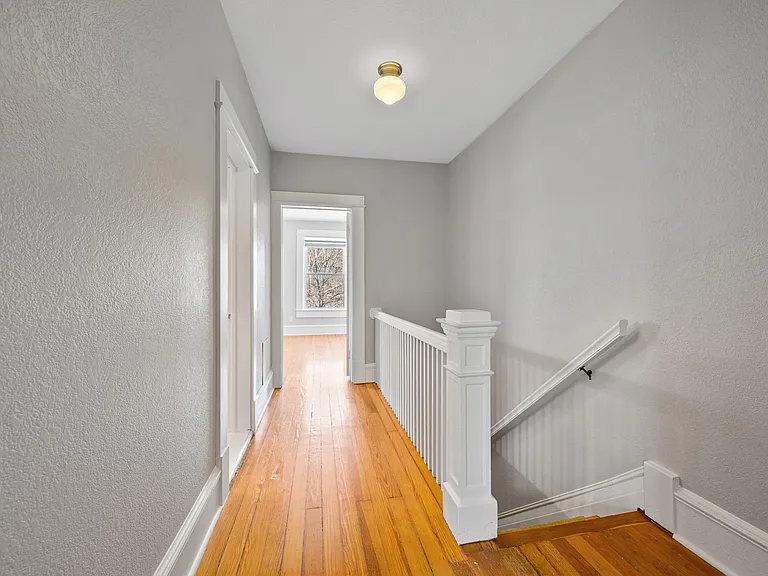 2nd floor hallway between the 2 bedrooms.