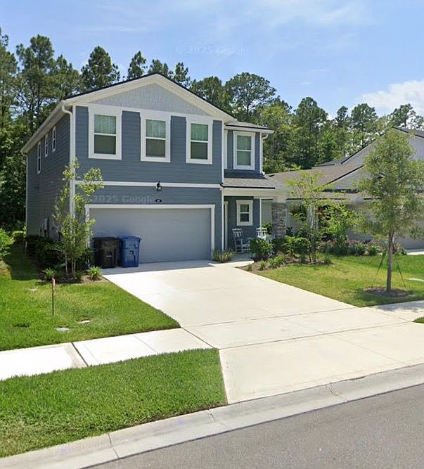 Modern two-story home with strong curb appeal, spacious driveway, and clean landscaping.