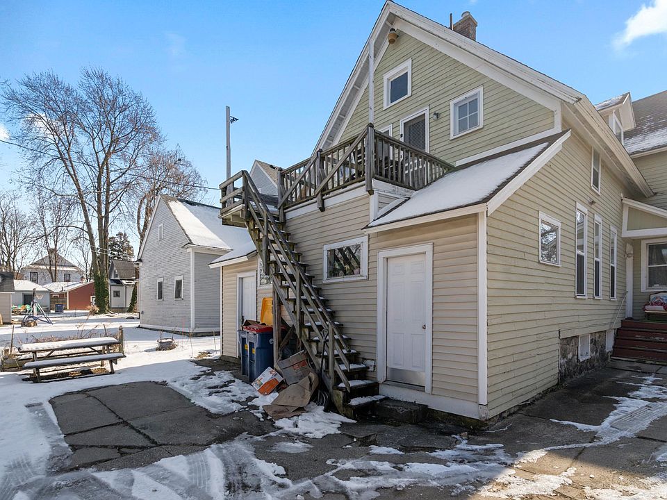 Back entry to laundry. Stairs lead up to apartment or you can you the front entrance.