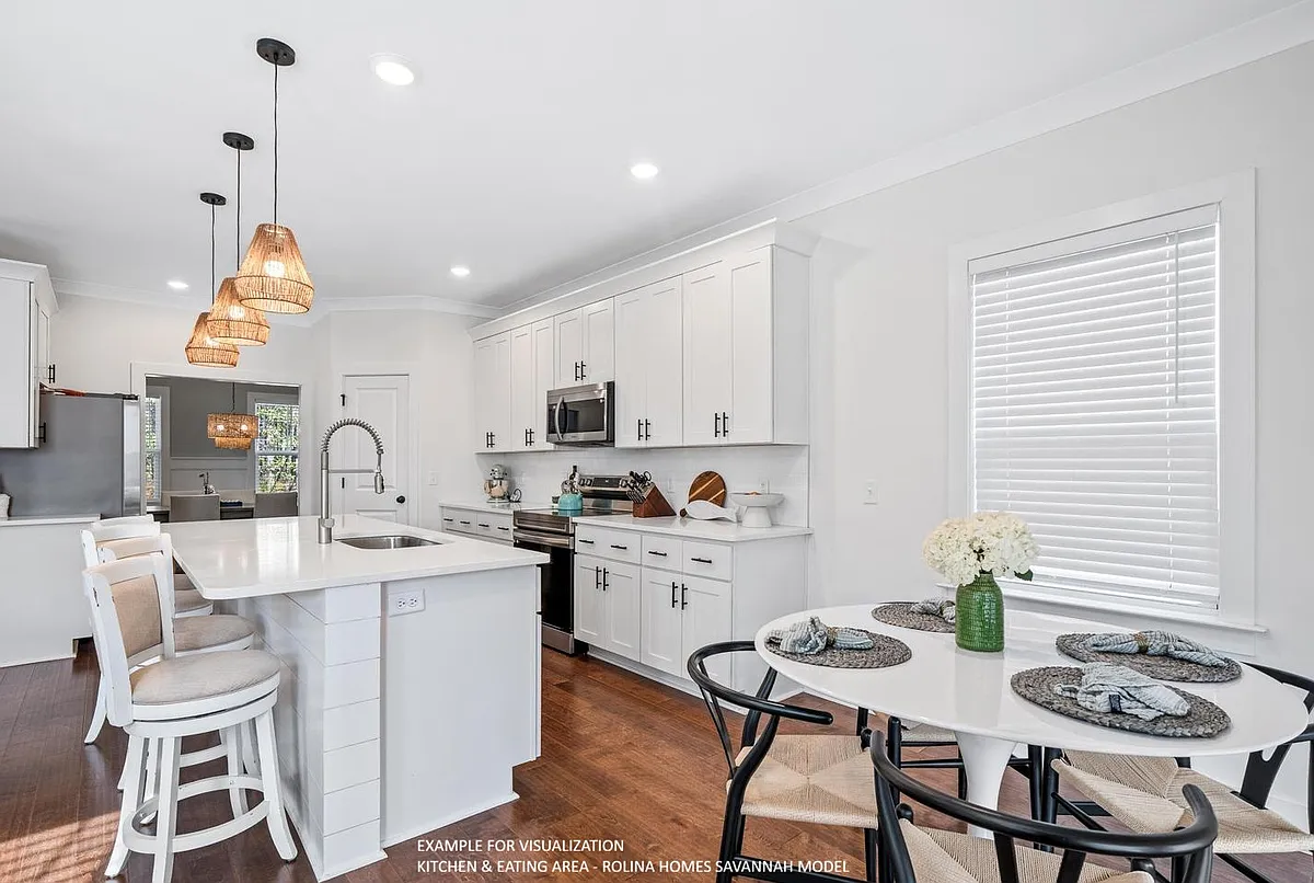 KITCHEN & EATING AREA PICTURE FROM A DIFFERENT SAVANNAH MODEL RECENTLY BUILT BY ROLINA HOMES - 5110 Hunters Trl