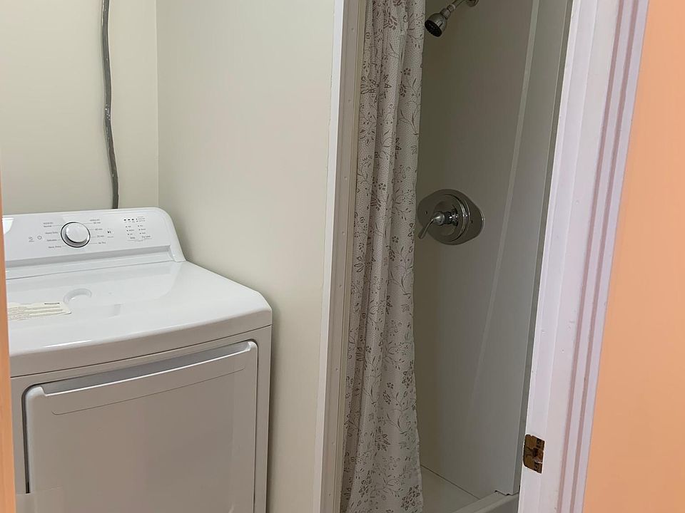 1448B Middletown Road 
Kitchen Entrance into First Floor Laundry with Toilet, Shower, Washer/Dryer