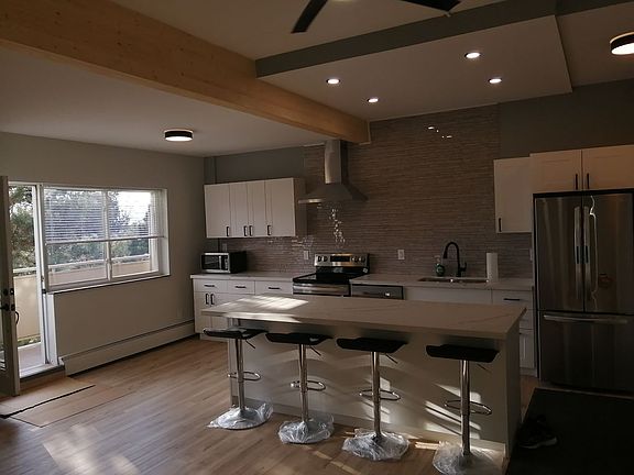 Custom counter-top, with 4 stools included.