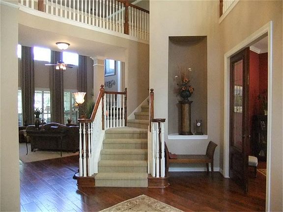 Beautiful upgraded hardwood floors everywhere you look... nothing standard in this home.