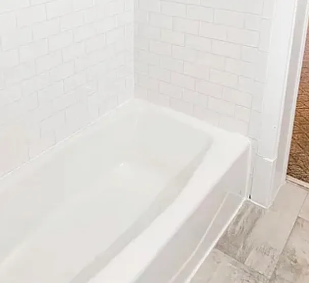 Recently renovated bathroom with subway tile.