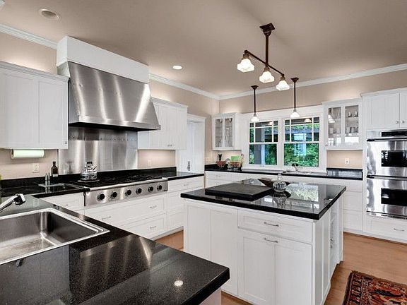 Anothr view to let you know that you have plenty of light in this wonderful gormet kitchen coming from both sides of kitchen. View too!