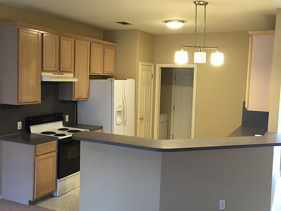 Kitchen area with bar