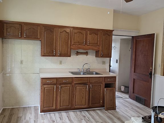 Kitchen...repairs still in process...New stove and refrigerator will be provided.