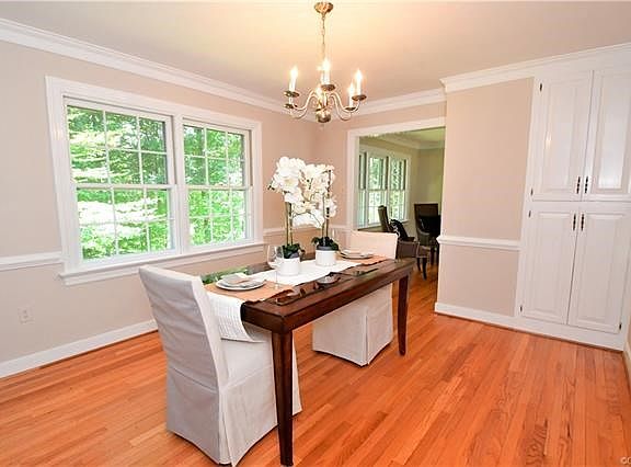 A Bon Air Must, the formal dining room off the kitchen, the corner cabinet is perfect for china storage or dining linens