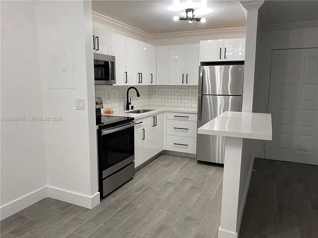 15550 SW 80th St #E-207 — Photo 1