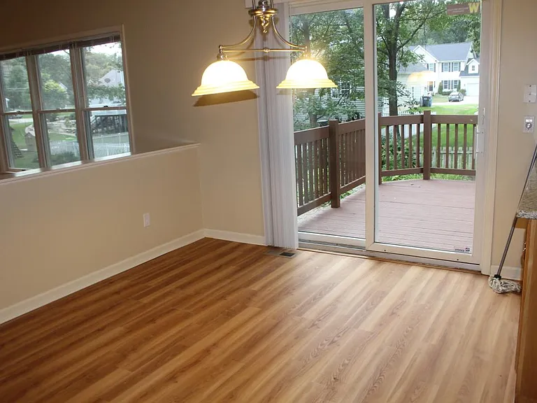 dining area with a sliding door to the deck