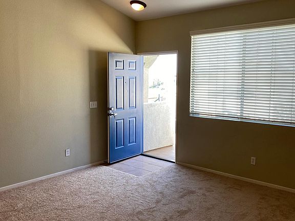 Entry deck and main entryway leading into the living room.