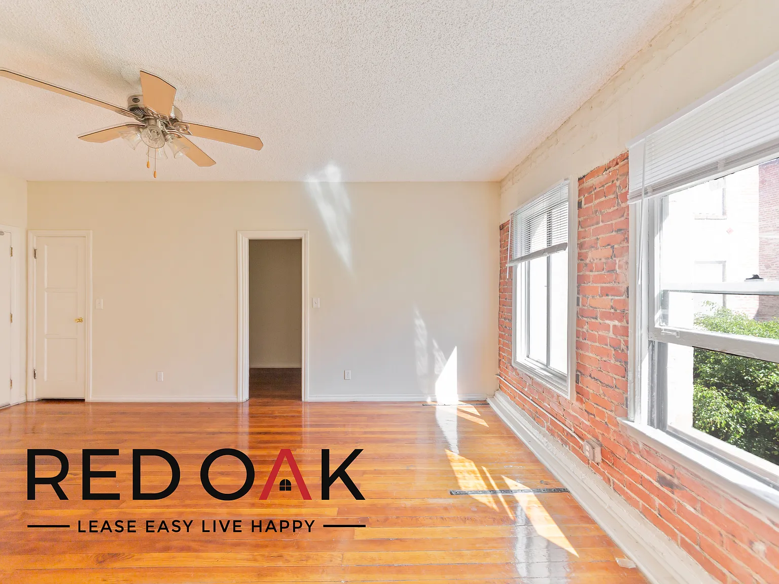 Cheerful Studio with Exposed Red Brick, Sunny Windows, and On-Site Laundry ~ In Prime Koreatown! — Photo 3
