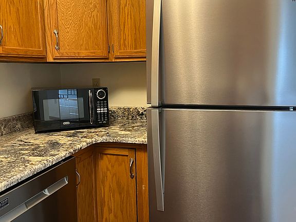 Appiances include stove, refrigerator, dishwasher, microwave