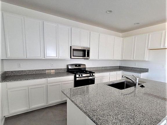 4th image of 40062 W Hensley Way