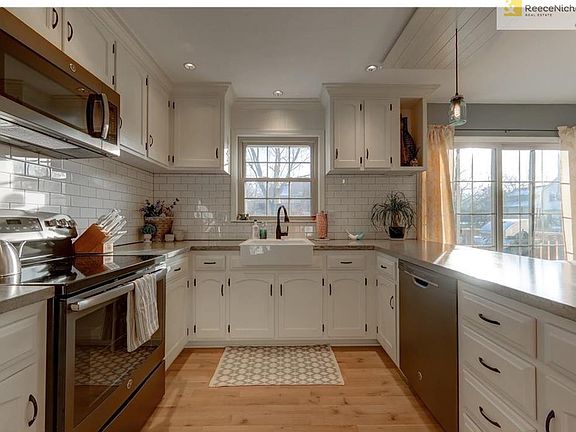 In 2016 the kitchen was remodeled to include appliances, hardware, concrete counter-tops, apron-sink and fixtures.