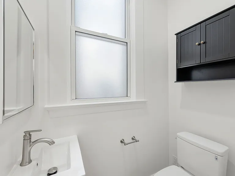 1/2 bathroom, updated and great for guests