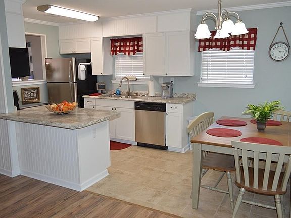 All new stainless appliances will convey with home.