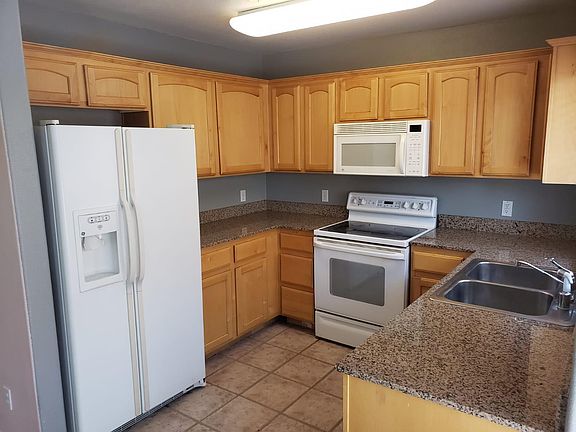 4th image of 8408 Tiger Woods Ave