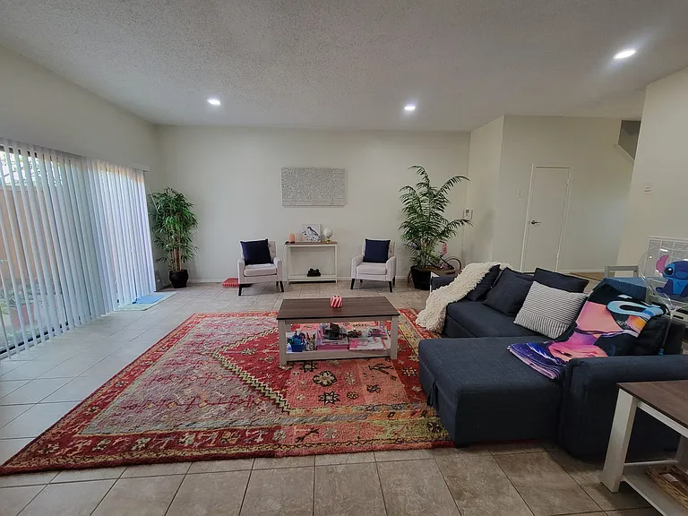 Living room and dining room furnished.