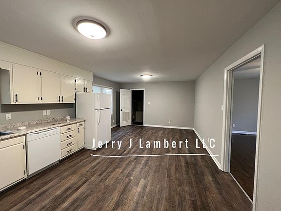 Kitchen and eating area and door to laundry open
