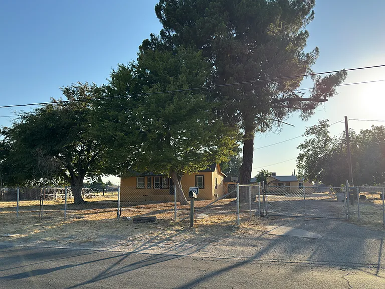 View from Street. Home is located in the back.